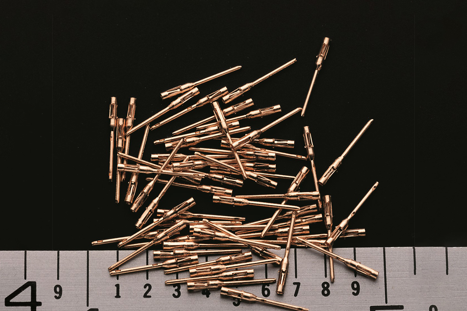 High-speed stamped electronic connector components